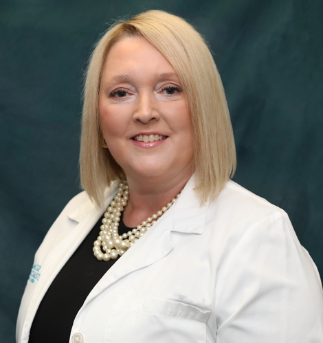 Professional headshot of Elizabeth Savu, advanced practice provider specializing in medical oncology and hematology at Cancer Specialists of North Florida